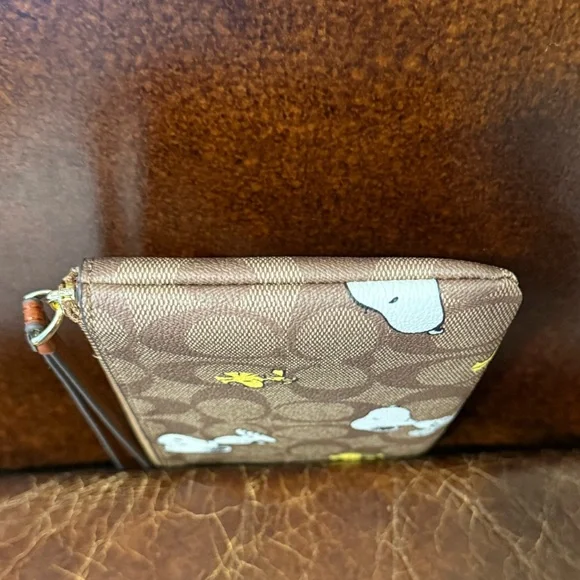 Coach x Peanuts Snoopy and Woodstock Brown Wristlet - Picture 5 of 9